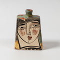 Botella baja pequeña